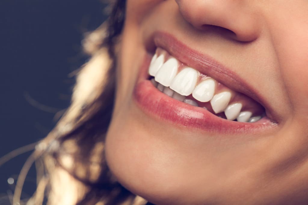 Woman with Porcelain Veneers | James A. Oshetski, DDS | Brunswick, ME